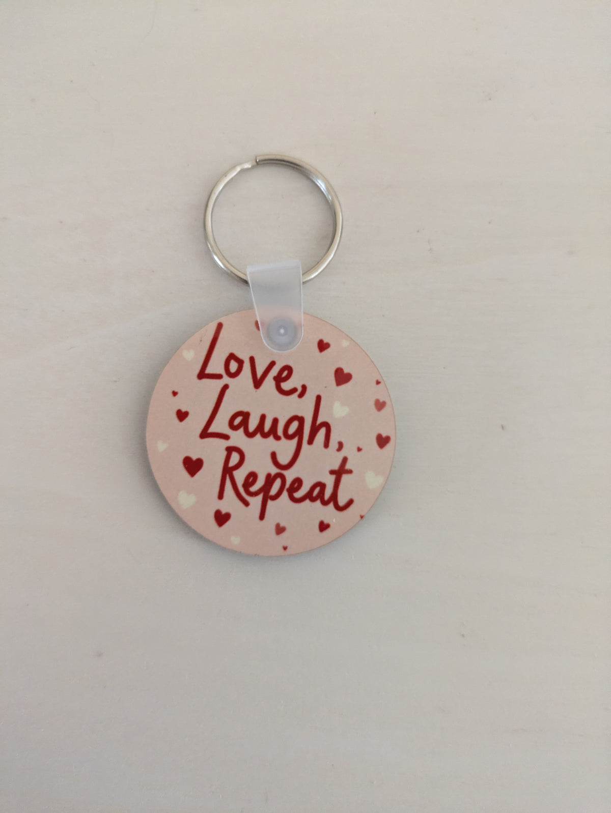LOVE, LAUGH, REPEAT KEYCHAIN